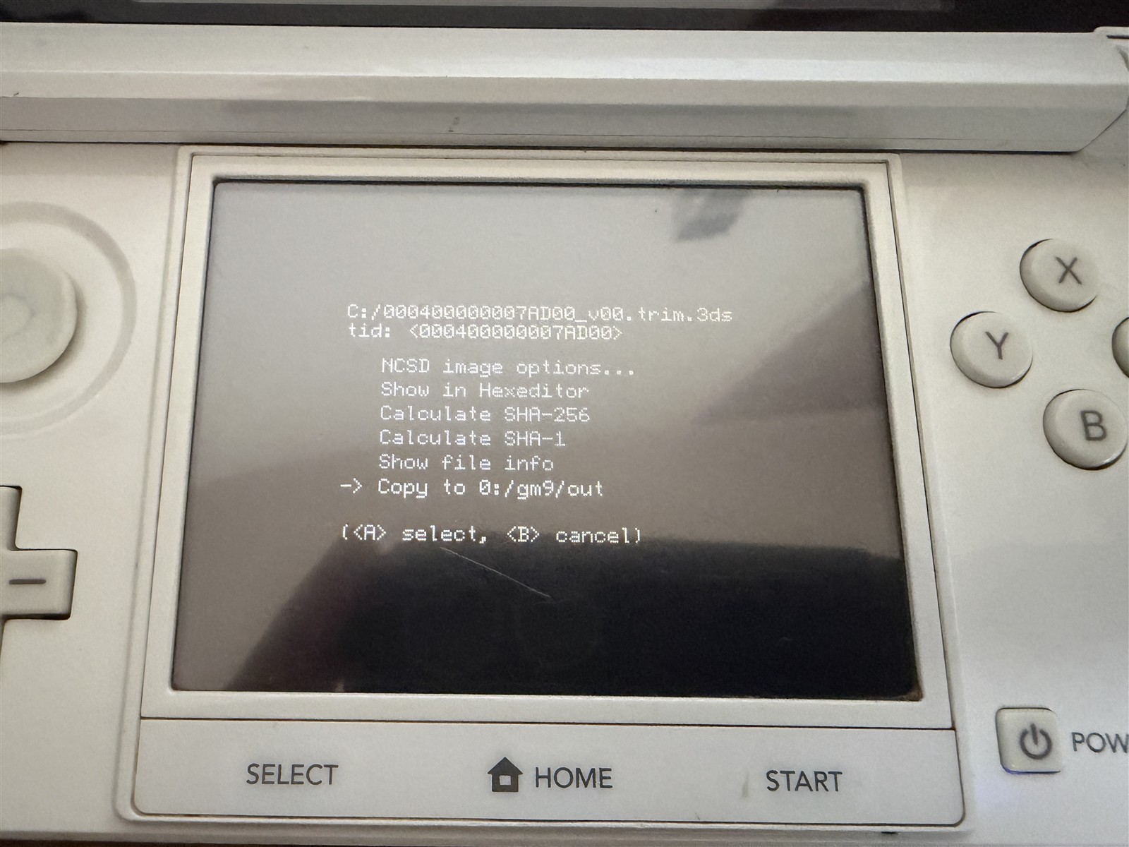 3DSゲームのtrim.3dsファイルでCopy to 0:/gm9/outを選ぶ画面